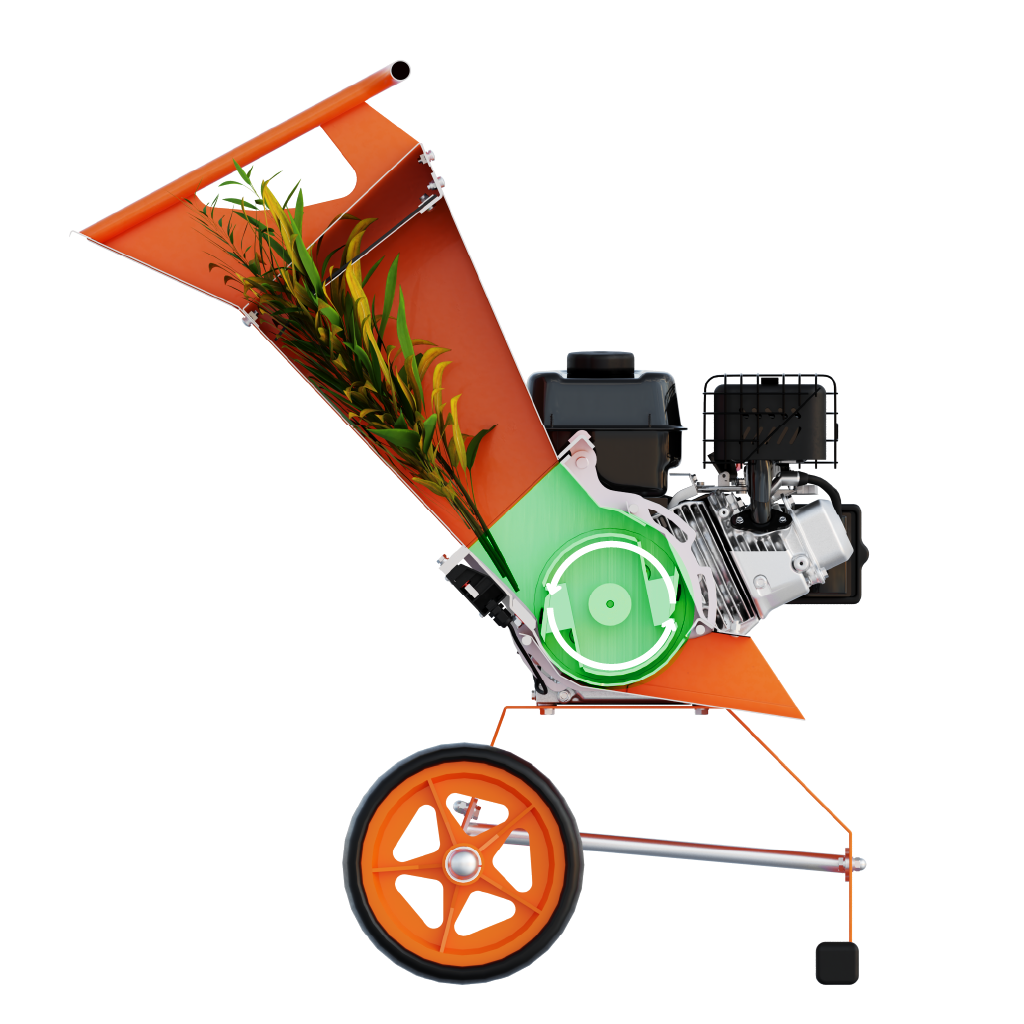 Wood chipper processing branches with leaves